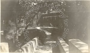 Image of View toward Faculty Club, UC, from Hearst Bridge; plants & walk join two objects