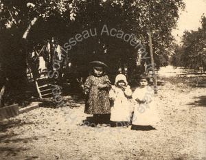 Image of Polhemus family toddlers in an orchard