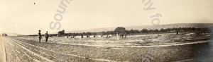 Image of Polhemus family members viewing fruit drying at Coyote Ranch