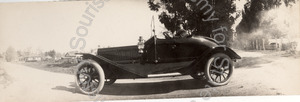 Image of Single roadster at a bend in the road