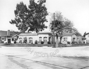 Image of Pomeroy house, view of the front and side of the house, from the street