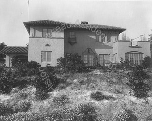 Image of Rear view of Wilson house and gardens, including porte cochere