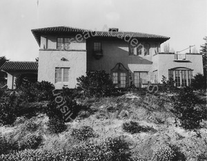 Image of Rear view of Wilson house and gardens, including porte cochere