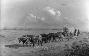 Image of Photograph of the canvas "Crossing the Plains" on an easel 