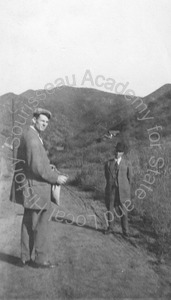 Image of Andrew P. Hill, Jr. on a road with an unidentified man