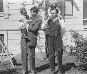 Image of Andrew P. HIll, Jr. with Birdella, an unidentified man and child