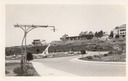 Image of Light standard without vines; also large sundial, Ingleside Terraces