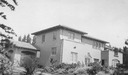 Image of Rear view of Wilson house and gardens, with porte cochere