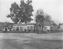 Image of Pomeroy house, view of the front and side of the house, from the street