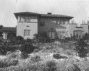 Image of Rear view of Wilson house and gardens, including porte cochere