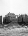 Image of Front gates of Wilson residence, with view of house behind them