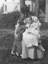 Image of Ruth McKenney Hill seated, with Birdella and Martha Hill